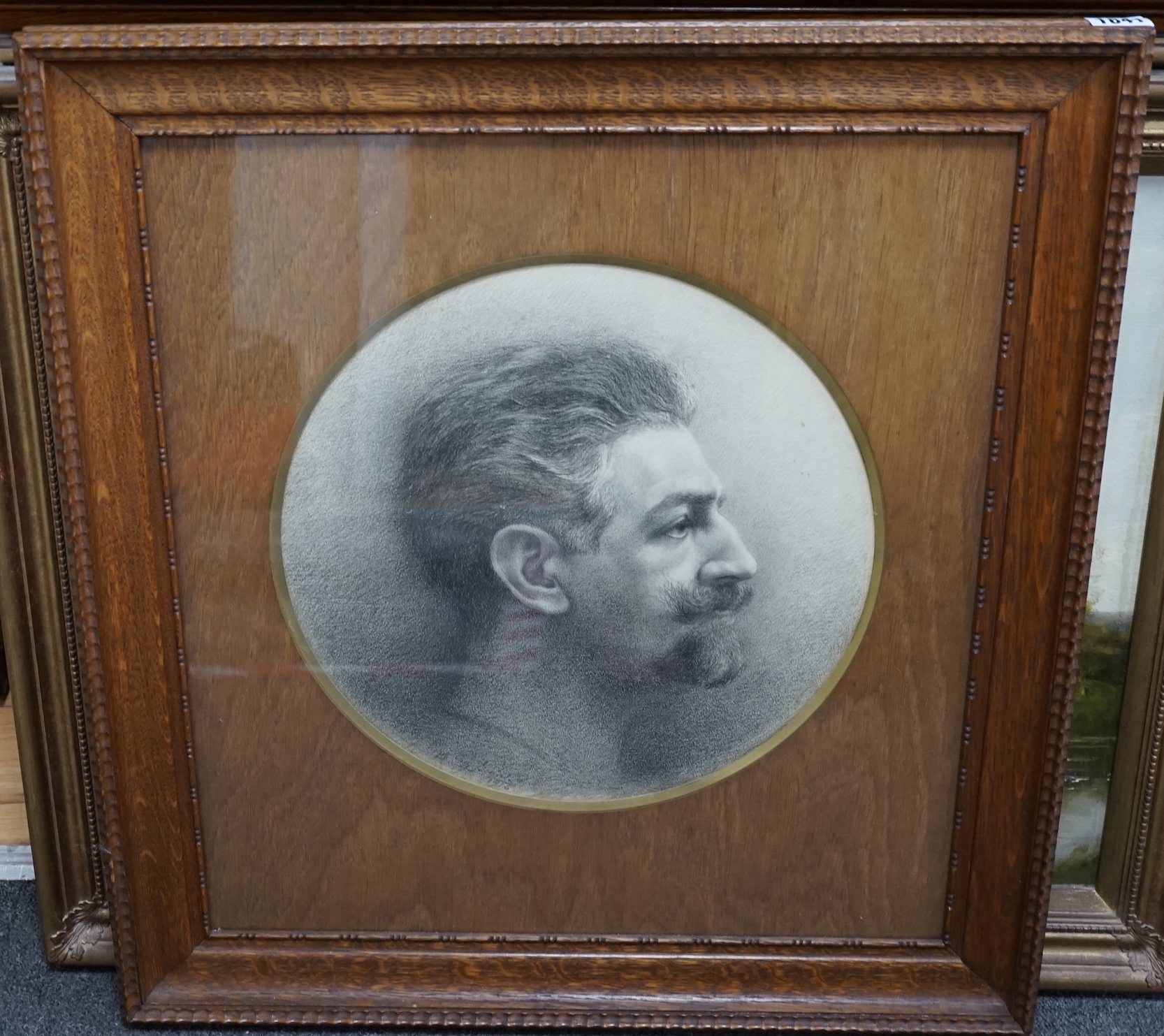 Early 20th century, charcoal, Portrait of Godefroid DeVreese (Belgian, 1861-1941), tondo, indistinctly signed and dated 1916, H. De Lau, Icelles label verso, 35cm in diameter. Condition - fair, a few minor spots of foxin